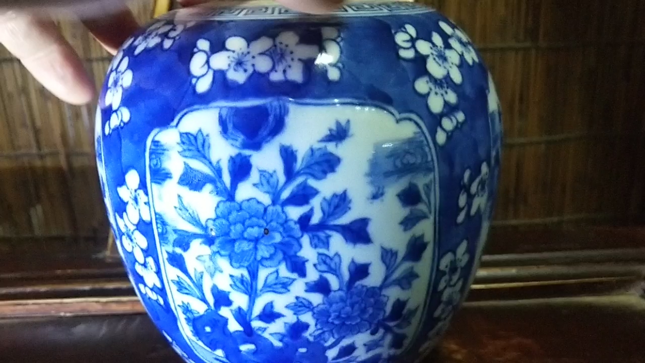 清代开光花卉青花人头罐