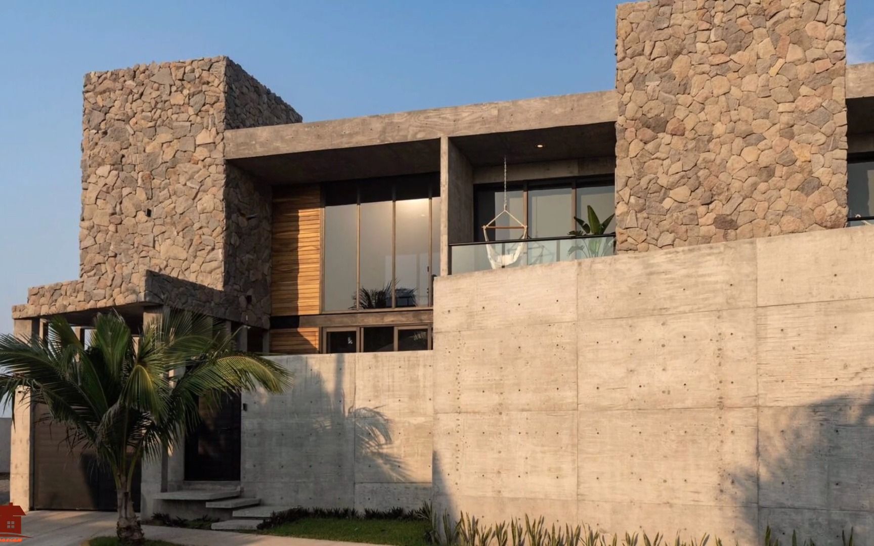 房屋质朴而现代的特色-混凝土,石材,木材和钢材材料