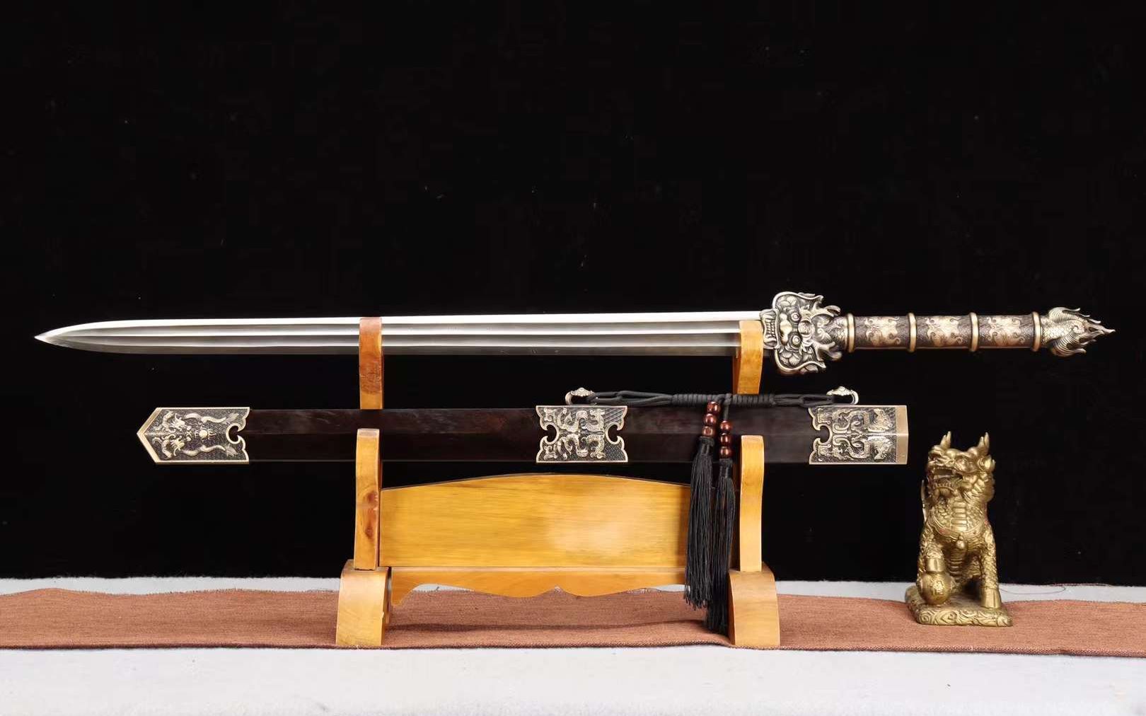 龙泉汉剑一汉龙剑.24寸百炼花纹钢扭转星纹手工锻打.一体纯铜柄.