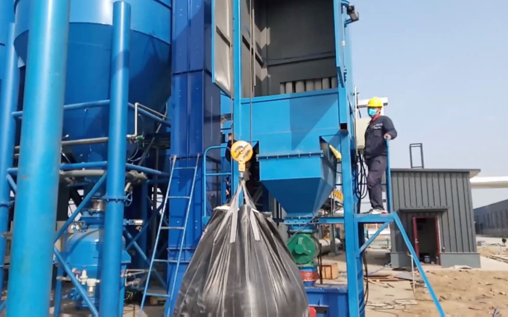 陶瓷粉吨包自动破袋机吨袋拆包装置使用现场