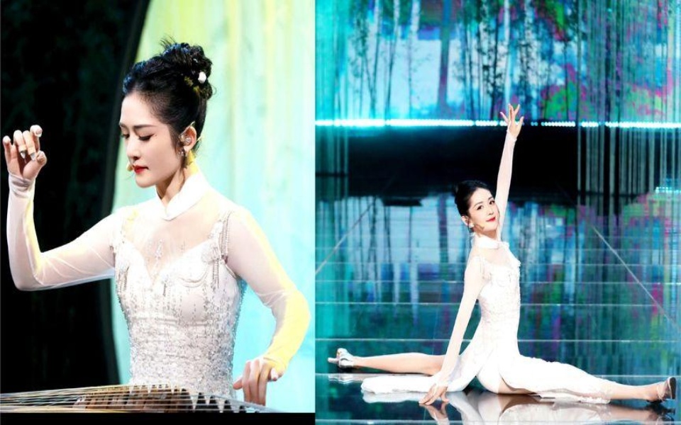乘风入画江南舞台,谢娜穿旗袍一字劈叉,弹奏古筝为舞台添彩.