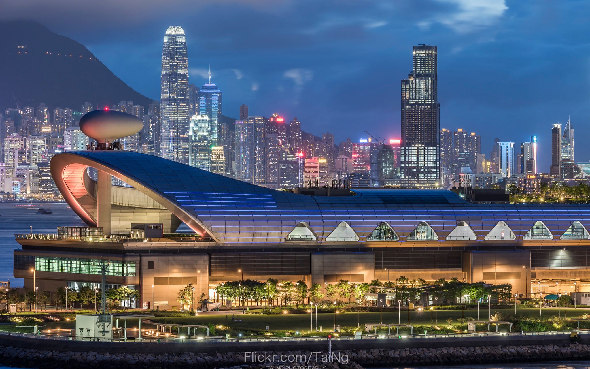 航拍香港城市启德邮轮码头和摩天大楼夜景灯光