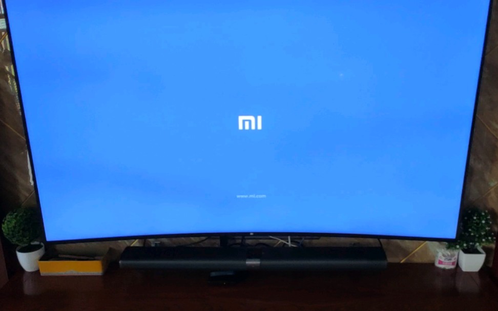 小米电视开机广告,home按键可去