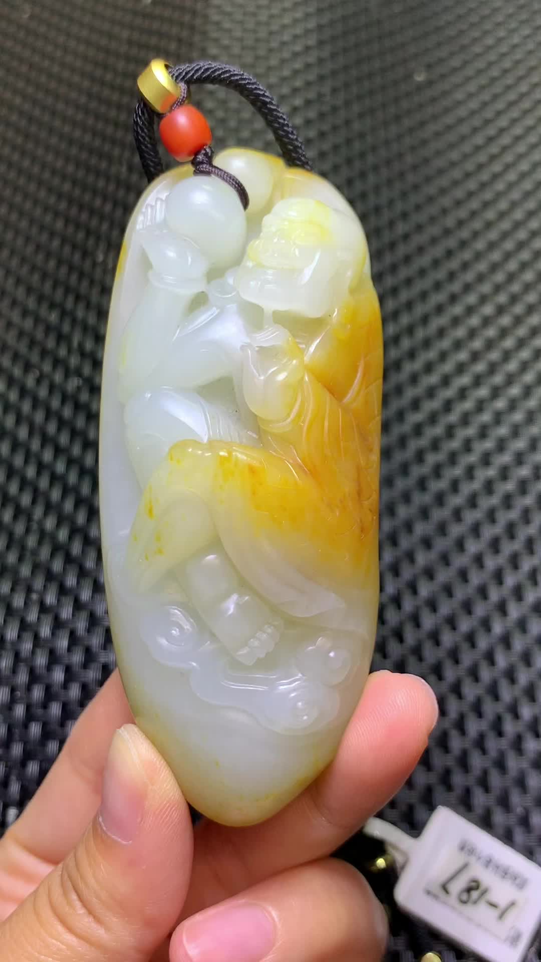 和田玉籽料罗汉手把件,料子老熟