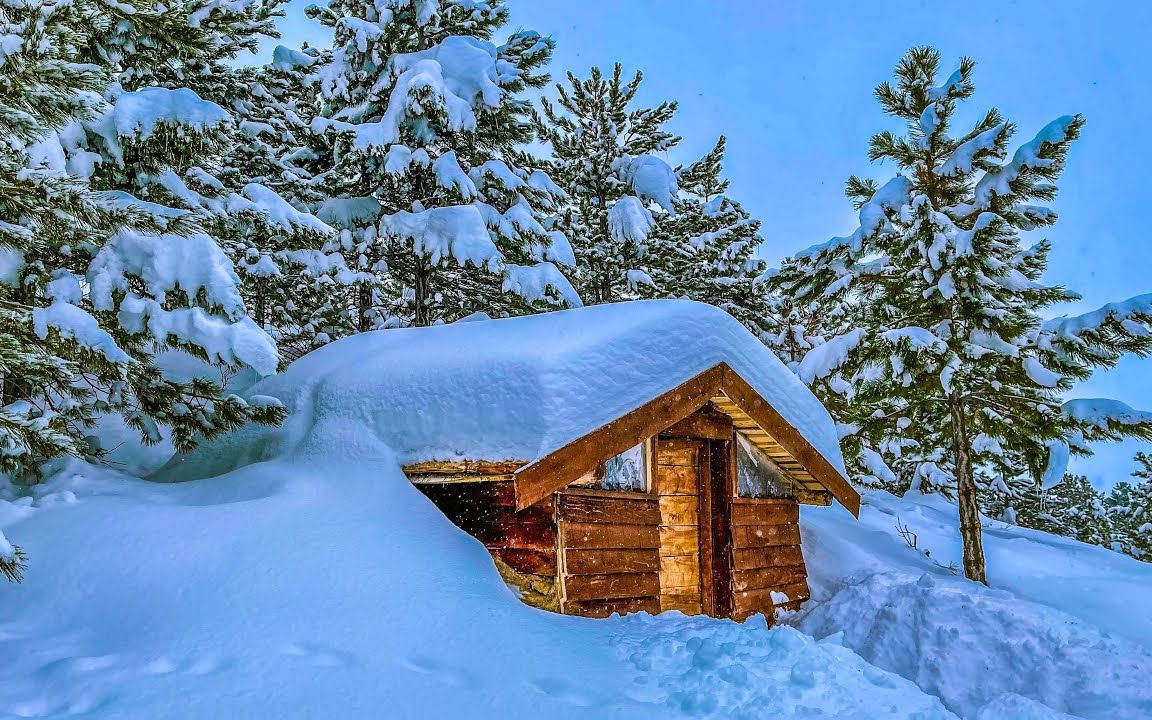 东北小木屋雪景图片